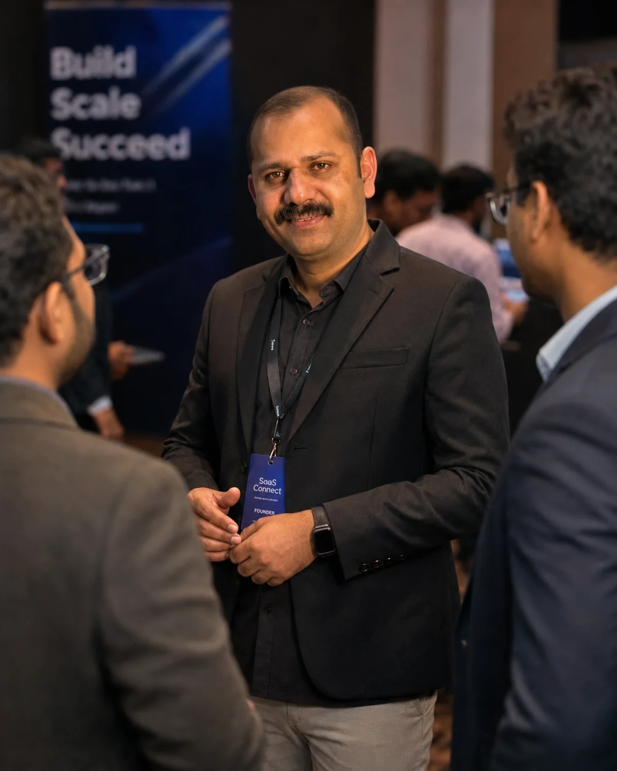 Reji Modiyil in a business networking conversation